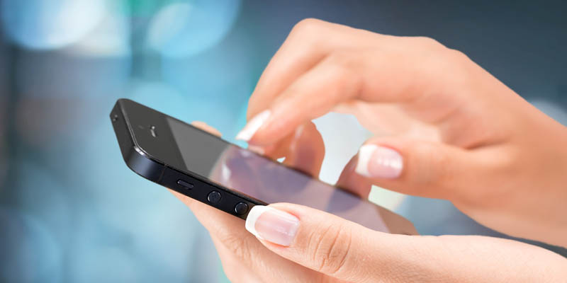 Woman searching on a mobile phone.