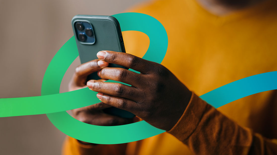 A person holding a cellphone surrounded by a gradient line of green to blue